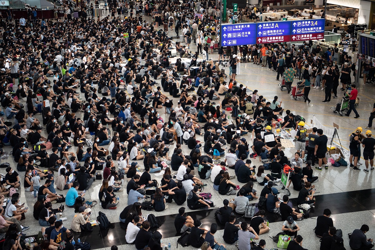 Anti-government protesters sit-in at Hong Kong airport