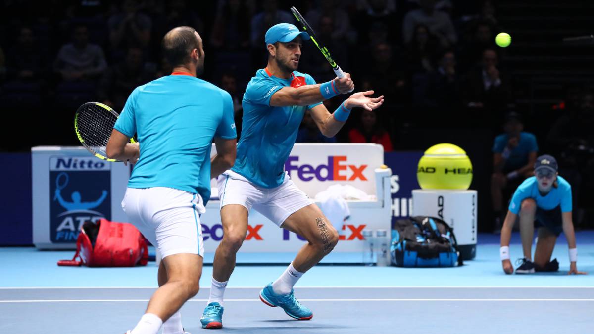 Cabal y Farah-AFP